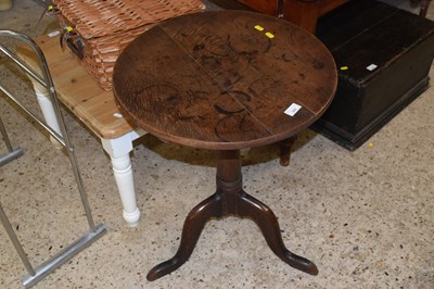 Lot 342 - An oak circular pedestal table