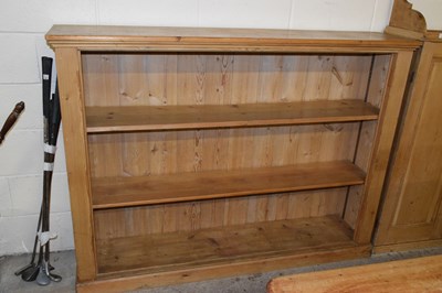 Lot 361 - A large pine open front bookcase, length 162cm