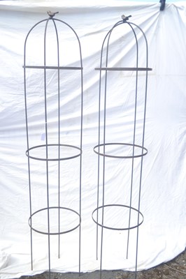 Lot 130 - A pair of tall metal garden cloches or plant...