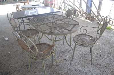 Lot 147 - Vintage metal garden table and matching four...