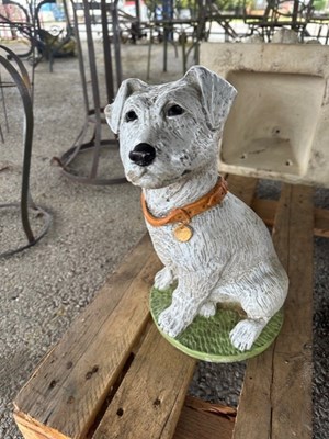Lot 161A - A painted composition figure of a seated dog,...