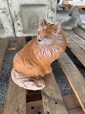 Lot 161B - A painted figure of a seated cat, height...