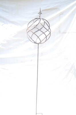 Lot 174 - A decorative metal garden ball on stand,...