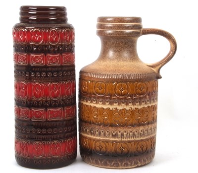 Lot 93 - Two West German vases, both featuring a...