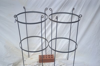 Lot 214 - A pair of metal garden plant supports, height...