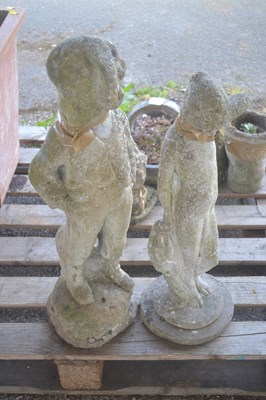 Lot 223 - A pair of composition garden statues