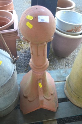 Lot 230 - An ridge tile with ornamental finial