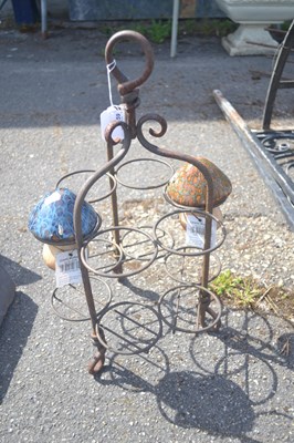 Lot 259 - A metal plant pot holder