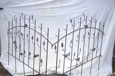 Lot 181 - A metal flower bed divider moulded with birds...