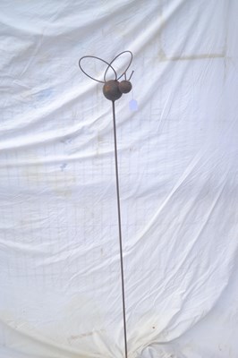 Lot 193 - A metal bee on stand, height approx 155cm