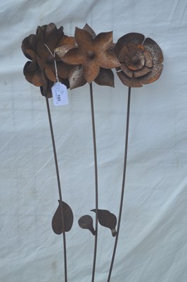 Lot 195 - Metal garden ornament formed as three flowers,...
