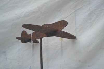 Lot 203 - A decorative metal aeroplane garden ornament,...