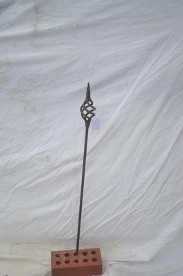 Lot 204 - A metal garden spike with decorative spiral...