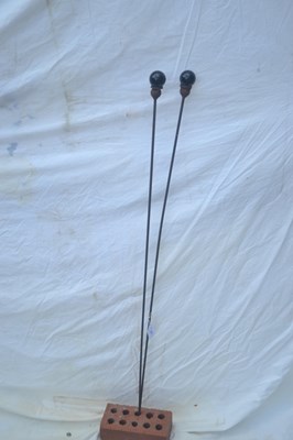 Lot 210 - Pair of balls on sticks, height approx 123cm