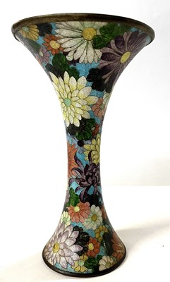 Lot 217 - An Oriental vase of trumpet form with lustre...