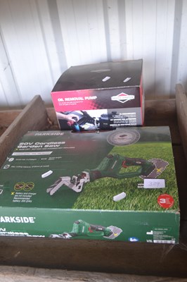Lot 390 - Briggs & Stratton oil removal pump together...