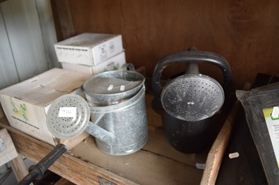 Lot 406 - Two various watering cans