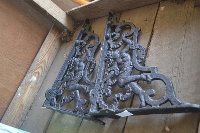 Lot 412 - Two cast metal brackets