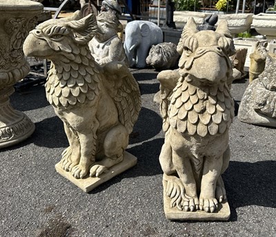 Lot 104 - Pair of large composition figures of Griffins