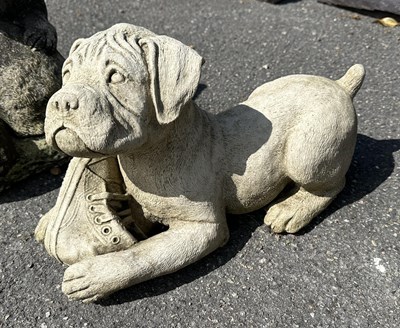 Lot 107 - Small moulded figure of a reclining Dog