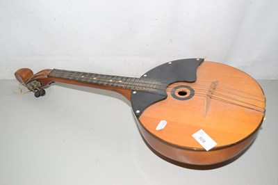 Lot 508 - A four string Domra