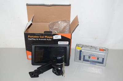Lot 525 - A Saisho portable cassette player together...