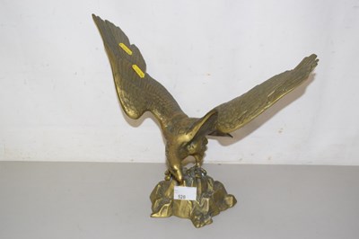 Lot 528 - A vintage brass desk figure of an eagle