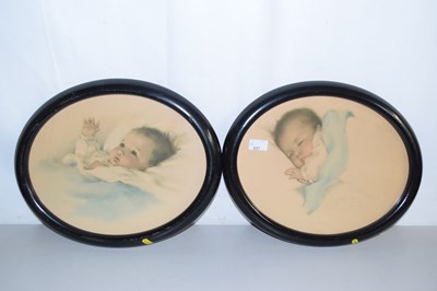 Lot 657 - Pair of oval framed studies of infants