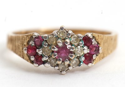 Lot 73 - A 9ct ruby and diamond ring, with central...