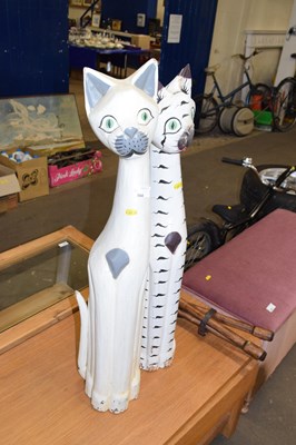 Lot 864 - Pair of wooden cat figures