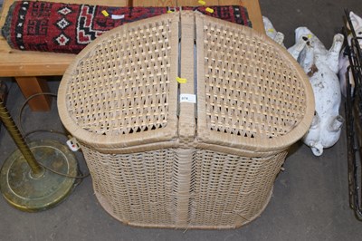 Lot 874 - A modern wicker clothes basket