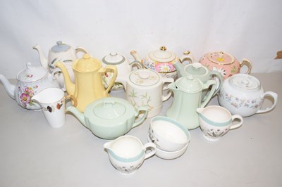 Lot 149 - A collection of various decorative teapots and...