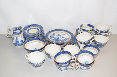 Lot 6 - A quantity of willow pattern tea wares, mainly...