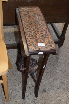 Lot 279 - A late Victorian carved drop leaf lamp table...
