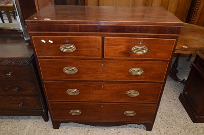 Lot 284 - A late Georgian mahogany chest with two short...