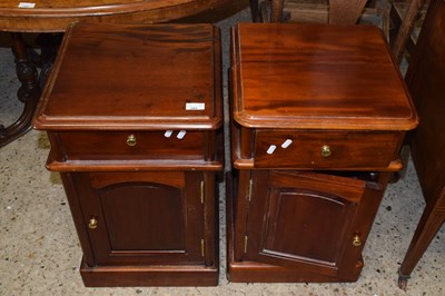 Lot 285 - A pair of 20th Century hardwood bedside cabinets