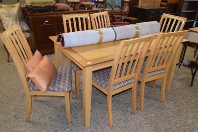 Lot 310 - Modern light wood dining table and six chairs