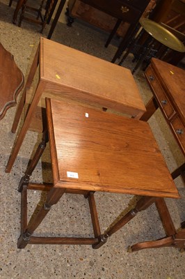 Lot 313 - Two 20th Century oak lamp tables