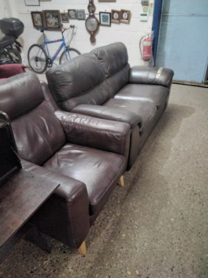 Lot 327 - A brown leather two seater sofa and...