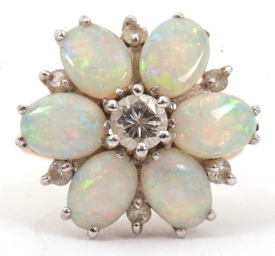 Lot 11 - An opal and diamond ring, the flowerhead...