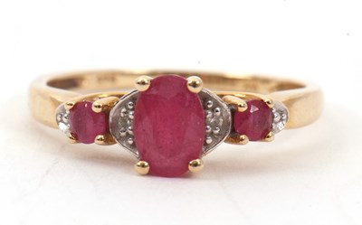 Lot 12 - A 9ct treated ruby and diamond ring, the...
