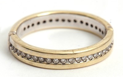 Lot 177 - A diamond set hoop clasp/charm, the hinged...