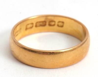 Lot 176 - A 22ct wedding band, 5mm wide, hallmarked...
