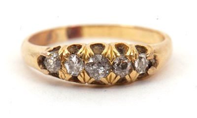 Lot 16 - A diamond ring, with five graduated old mine...