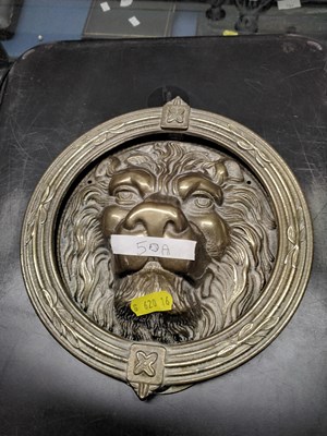 Lot 50A - a large lion faced door knocker