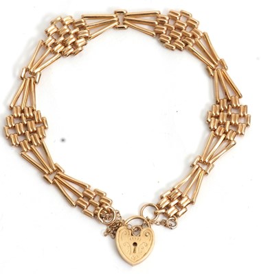 Lot 162 - A 9ct gate bracelet, with jump ring stamped...