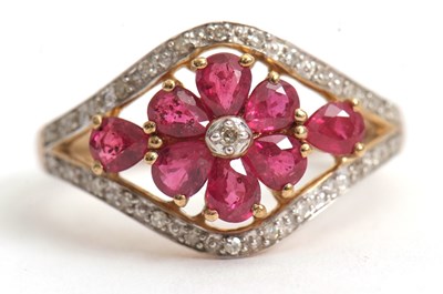 Lot 65 - A 9ct ruby and diamond ring, the central...