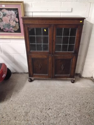 Lot 246 - Early 20th Century oak lead glazed bookcase...