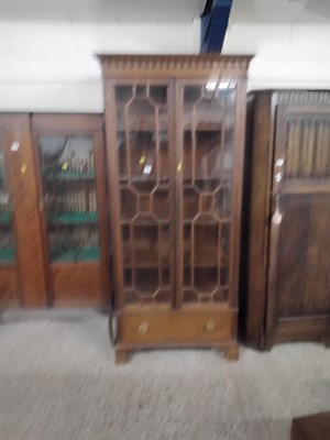 Lot 255 - A 20th Century mahogany display cabinet with...