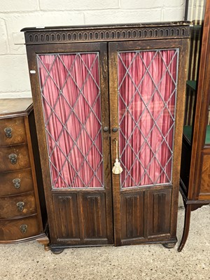 Lot 253 - A 20th Century lead glazed bookcase cabinet...